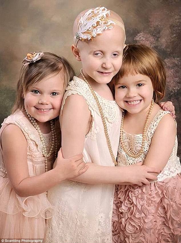 Stunning smiles: At the time of the second reunion, Rheann (center) had just completed her last round of chemotherapy the week before