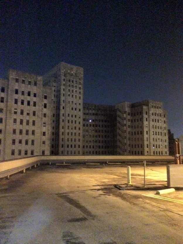 Picture yourself walking by an abandoned hospital, looking up, and seeing just one light on: