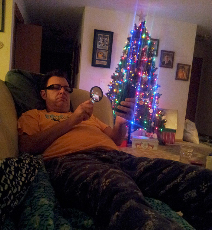 My Dad Using His Facebook App On His Phone.