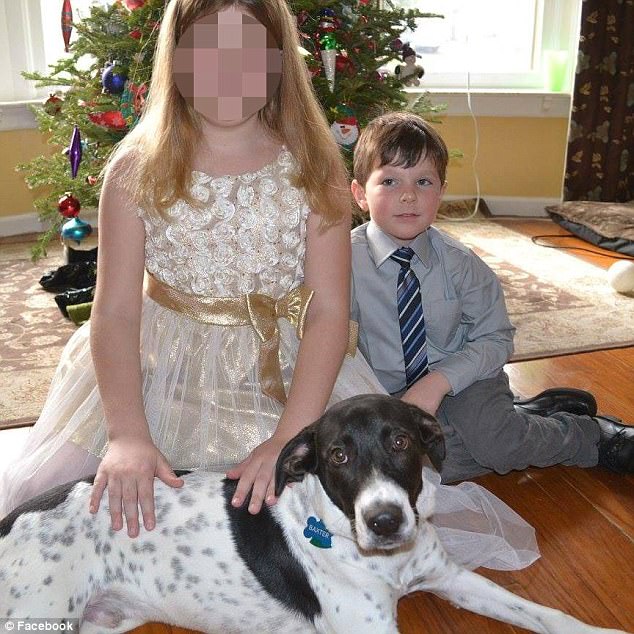 Bruno is pictured above in a family photo with a dog. It's unclear if the dog in the picture is the dog responsible for the tragic accident 