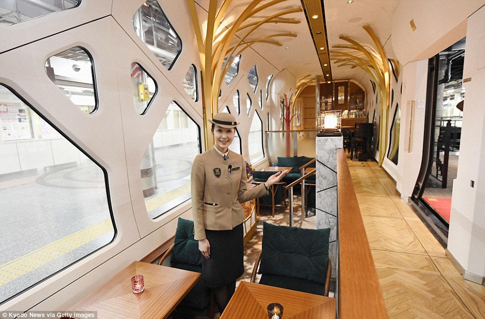 The walls feature a patterned designed to ‘evoke an image of a quiet forest’ in the lounge car