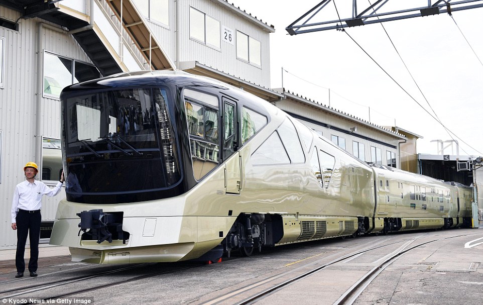 Golden exterior: The ten-car train has 17 guest compartments each accommodating two passengers