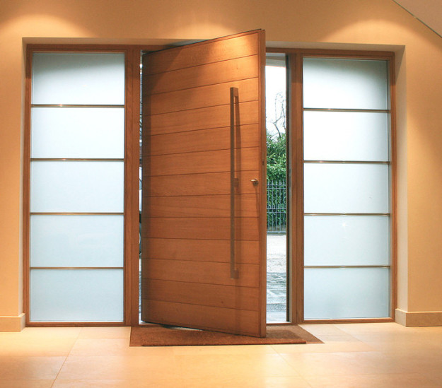 This is a pivoting door, also referred to as a "rich person's door."