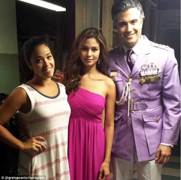Big break: Santo (centre, with Gina Rodriguez and Jaime Camil), who appeared in the first season of Jane the Virgin, met Katz in November of 2015 at a photo shoot in Hawaii