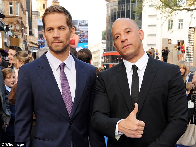 Support: Cody also confirmed Vin Diesel, who plays Dominic Toretto, is 'very interested' in shooting the next film in Australia. Pictured: Vin Diesel and Paul Walker in 2013
