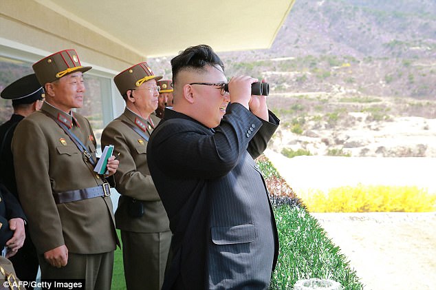 North Korea has 1.2 million in its armed forces and almost eight million in reserve, while South Korea has barely half the numbers but far better weapons. Pictured Kim Jong-Un inspecting special forces 