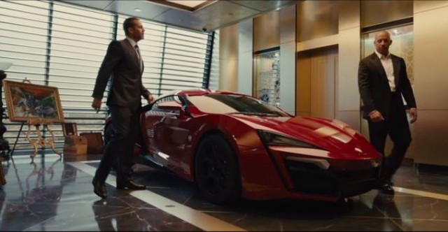 Walker and Diesel in a scene checking out the Lykan Hypersport