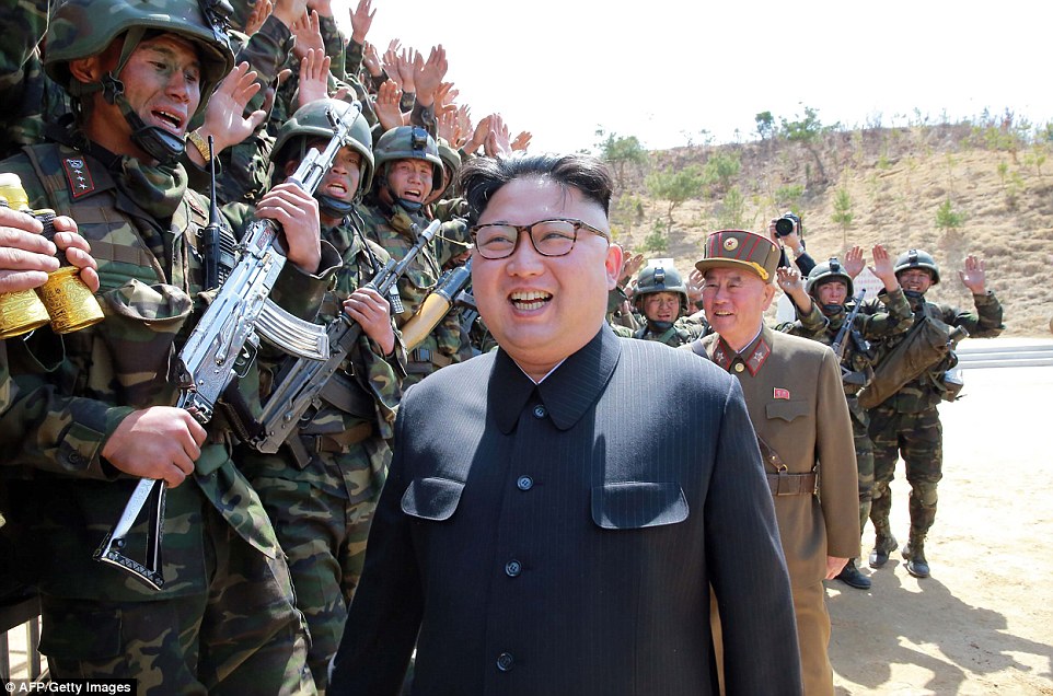 Other troops marching appear to be holding silver-plated rifles (like the one held by the soldier standing to the left of Kim Jong-Un), but Pregent believes 'these are most likely painted'