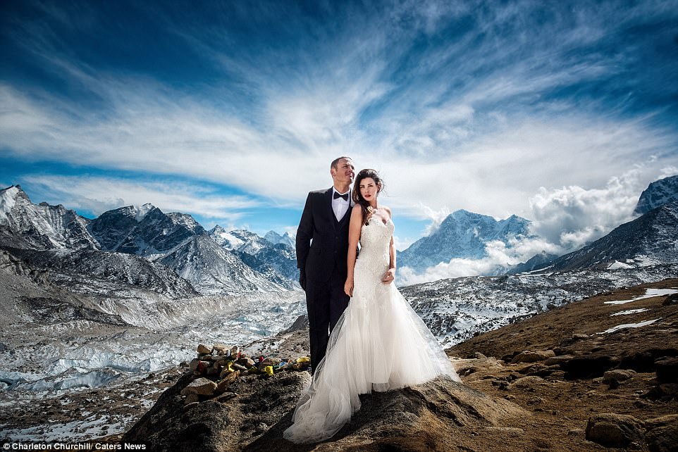 On top of the world: James Sissom and Ashley Schmeider travelled thousands of miles to tie the knot on Mount Everest