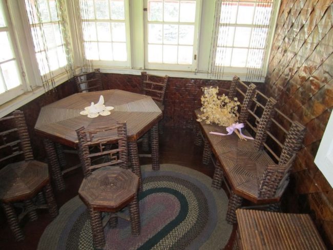 Others have been carefully fashioned into tables and chairs. All in all, Stenman estimates that he used 100,000 newspapers to build his house and furnishings. 