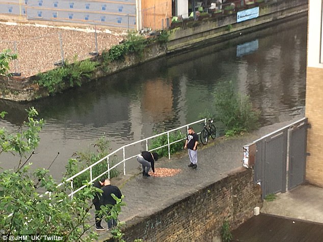 Businessman Jamahl McMurran and Lana Mesic, a Croatian artist and photographer who was staying with him, carried out the stunt on the towpath of Regent’s Canal, near Kingsland Street, at 9am yesterday