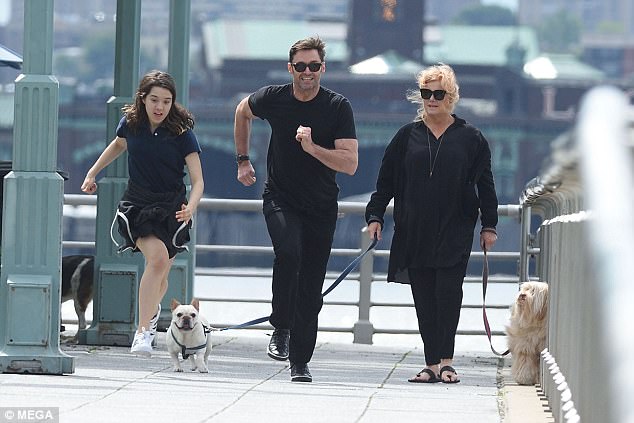 All together: The 48-year-old was joined by wife Deborra-Lee Furness and their daughter Ava