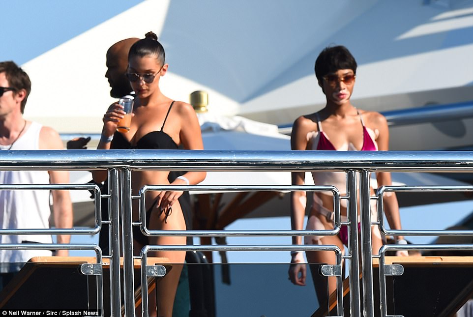 Bevy of beauties: Bella and Winnie both chose the skimpiest of bikinis to make the most of the scorching temperatures