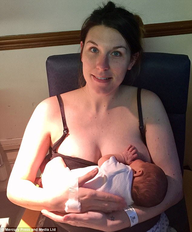 Tiring: Liz Hicks often found herself covered in sick while breastfeeding daughter Sydney