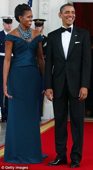 Above the couple is pictured at the state dinner in March 2012